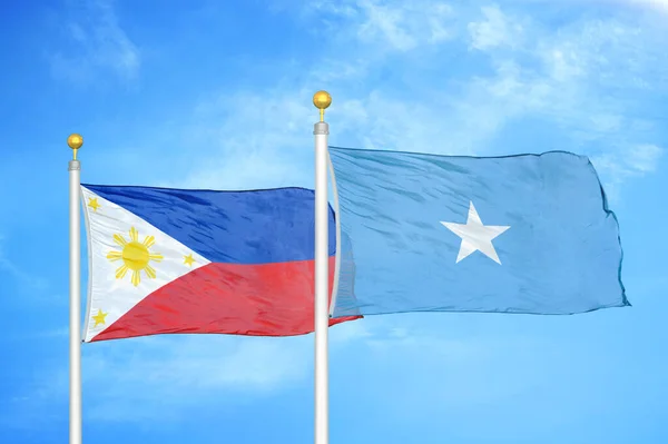 Philippines Somalia Two Flags Flagpoles Blue Cloudy Sky Background — Stock Photo, Image