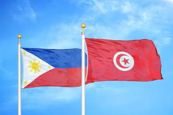 Philippines Tunisia Two Flags Flagpoles Blue Cloudy Sky Background — Stock Photo, Image