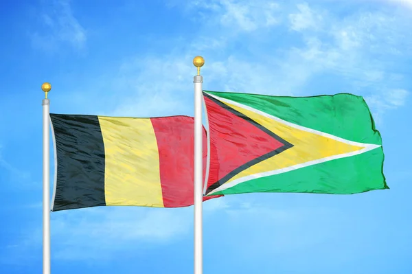 Belgio Guyana Due Bandiere Pennoni Cielo Azzurro Nuvoloso Sfondo — Foto Stock