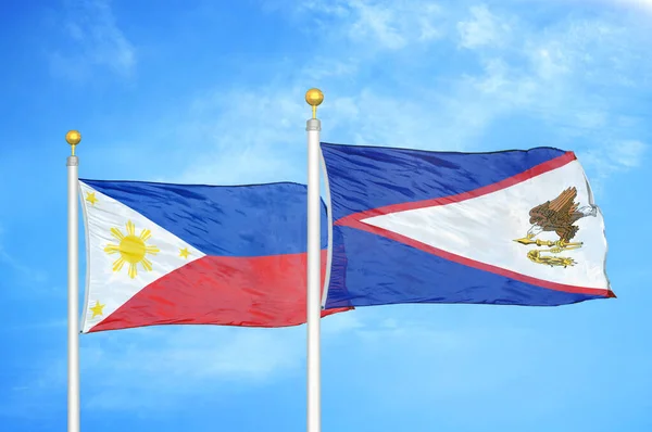 Philippines American Samoa Two Flags Flagpoles Blue Cloudy Sky Background — Stock Photo, Image
