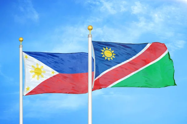 Philippines Namibia Two Flags Flagpoles Blue Cloudy Sky Background — Stock Photo, Image
