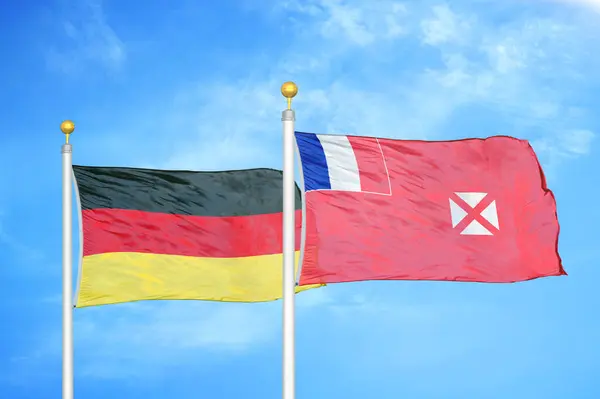 Alemanha Wallis Futuna Duas Bandeiras Mastins Azul Céu Nublado Fundo — Fotografia de Stock
