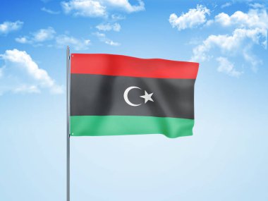 Bulutlu gökyüzünde Libya bayrağı dalgalanıyor