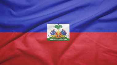 Kumaş dokusunda Haiti bayrağı sallıyor.