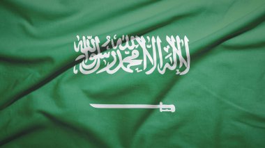 Kumaş dokusunda Suudi Arabistan bayrağı sallıyor
