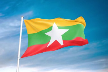 Bulutlu gökyüzünde Myanmar bayrağı dalgalanıyor.