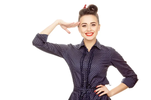 Young happy pinup girl in a dotted dress — Stock Photo, Image