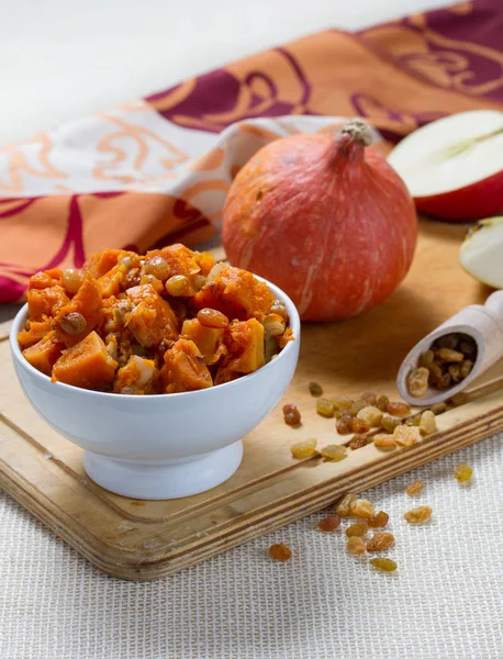 Pumpkin dessert with apple, cinnamon and raisins — Stock Photo, Image