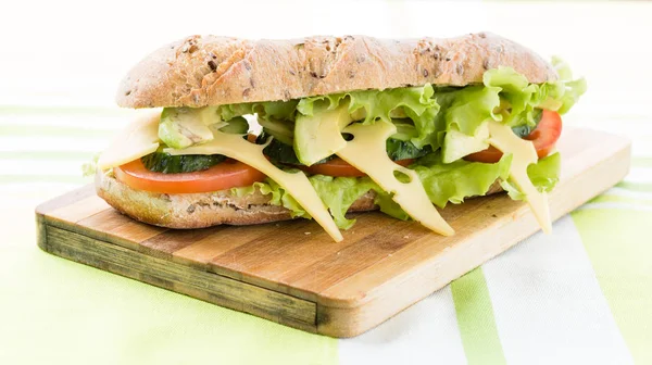 Fitness sandwich with avocado and cheese and black coffee — Stock Photo, Image