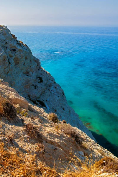A beautiful sea landscape with a clean blue sky and a cliff. Cyprus.