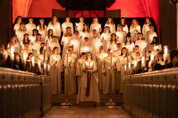 Vaxjo, Sweden - December, 2019. Saint Lucia Day choir celebrates the coming of Christmas — Stock Photo, Image