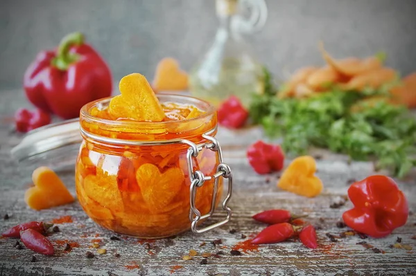Homemade pickled carrots with garlic and chili in glass jars — Stock Photo, Image