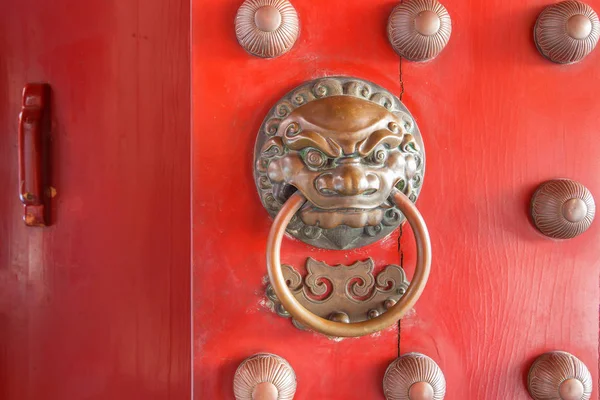 Stock image China Town Red Door Guardian Brass Handle