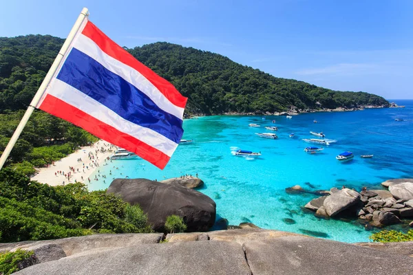 Travel concept, Tropical beach beautiful sea and blue sky at Similan island with thai flag foreground, Andaman sea, Thailand — Stock Photo, Image