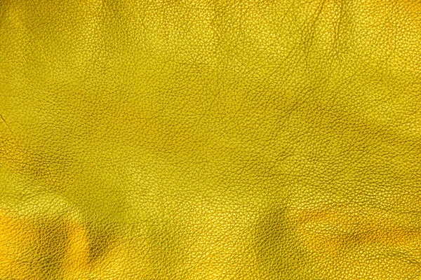Primer plano plano plano de fondo de textura de cuero dorado —  Fotos de Stock