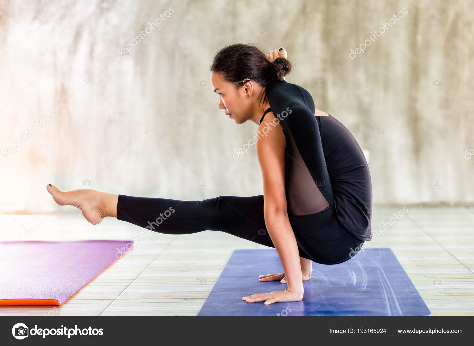 Premium Photo  Asian woman practicing advanced yoga pose