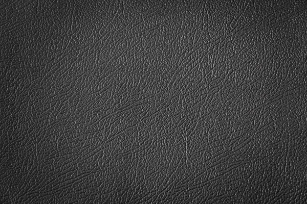 Gros plan cuir noir et fond de texture — Photo