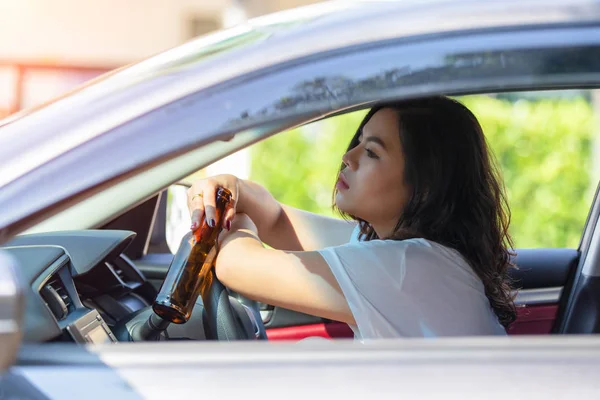 Young Asian Woman Drinking Beer While Driving Car — Stock Photo, Image