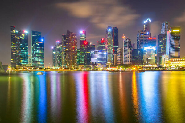 Landscape of the Singapore financial district and business building at night