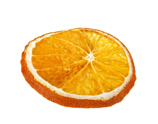 Rebanada seca de naranja sobre un fondo blanco — Foto de Stock