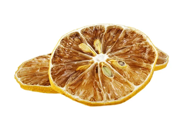 Uitgedroogde citroen segmenten geïsoleerd op witte achtergrond — Stockfoto