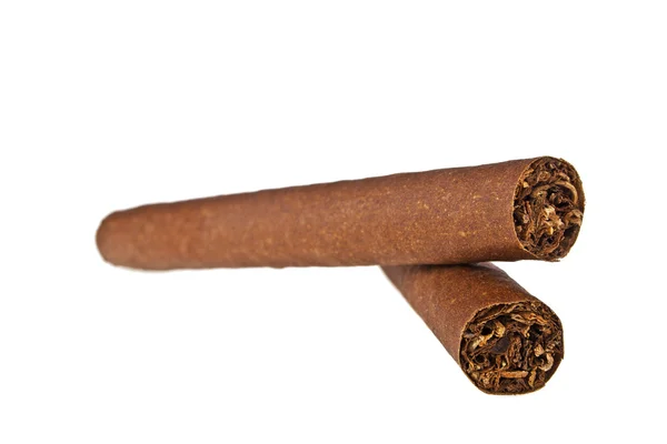 Due sigari, uno sull'altro, su sfondo bianco — Foto Stock