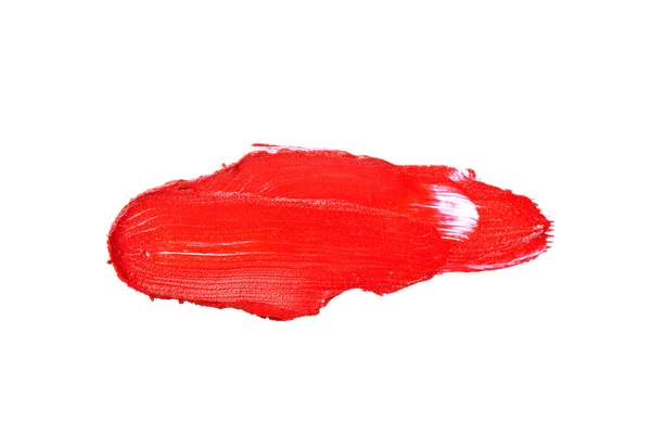 stock image Red color lipstick stroke on white background