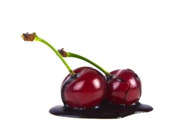 Cherries in chocolate on a white background clipart
