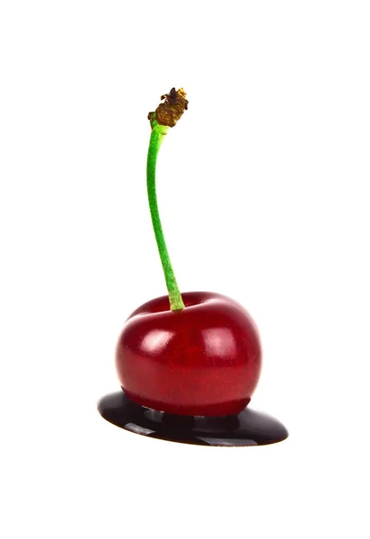 Cherry, csokoládé, a fehér háttér — Stock Fotó