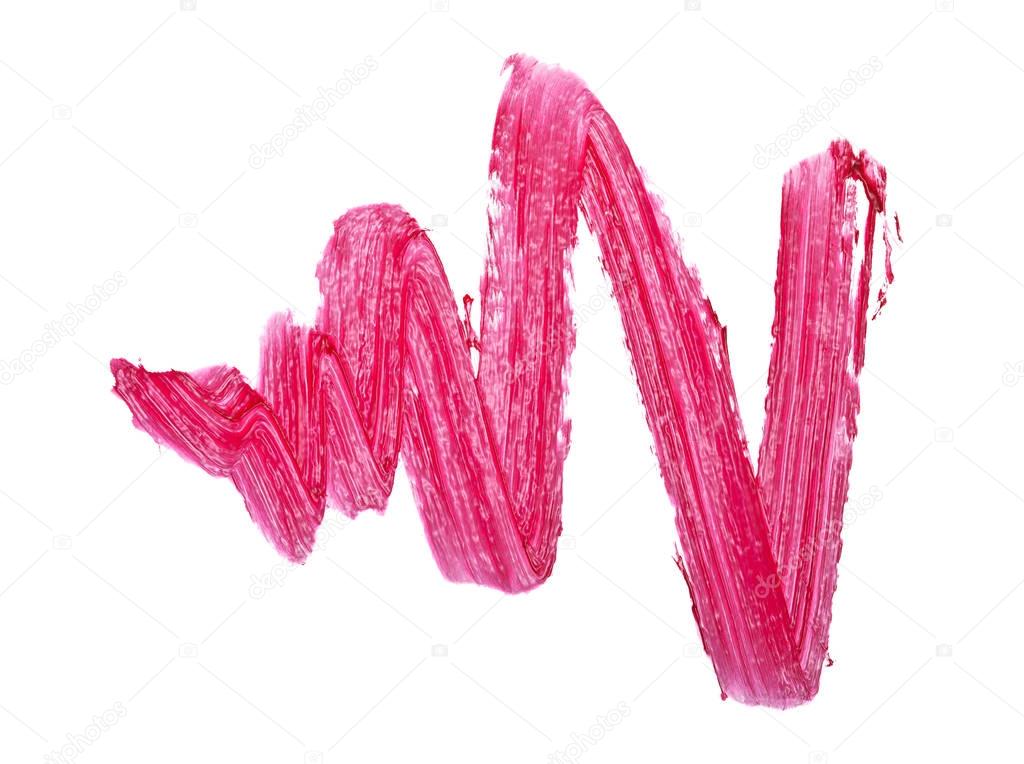 Pink color lipstick stroke on white background