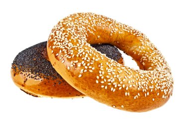 Beyaz bir arka plan üzerinde haşhaş tohumu ve susam çörek ile simit