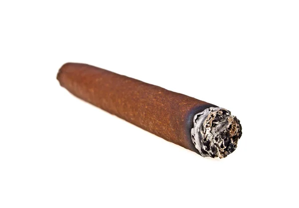 Cigarrillo marrón quemado sobre fondo blanco — Foto de Stock