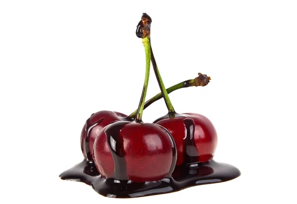 Cherries in chocolate on a white background — Stock Photo, Image