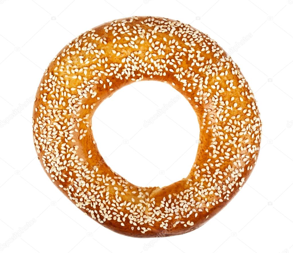Sesame seeded bagel isolated on a white background