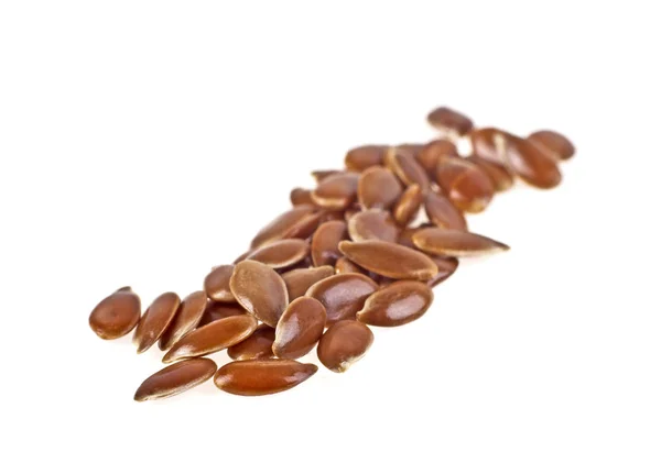 Close up of flax seeds isolated on white background — Stock Photo, Image