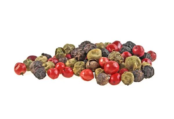 Hoop van diverse peper peper zaden mix op witte achtergrond — Stockfoto