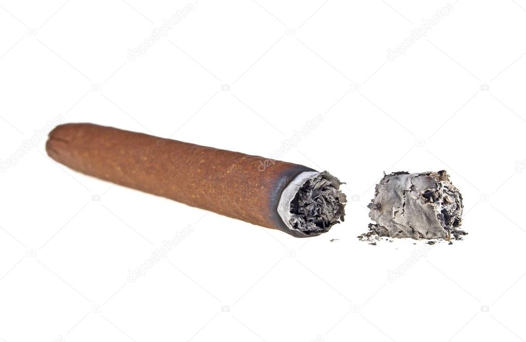 Burning brown cigar isolated on a white background