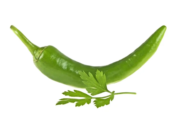 Groene chilipeper en peterselie op een witte achtergrond — Stockfoto