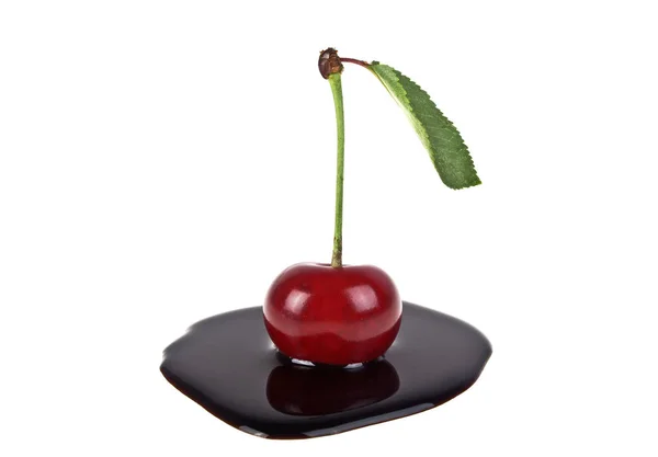 Cherry in chocolate on a white background — Stock Photo, Image
