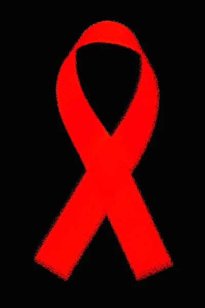 Abstraktní aids povědomí červenou stuhou na černém pozadí — Stock fotografie