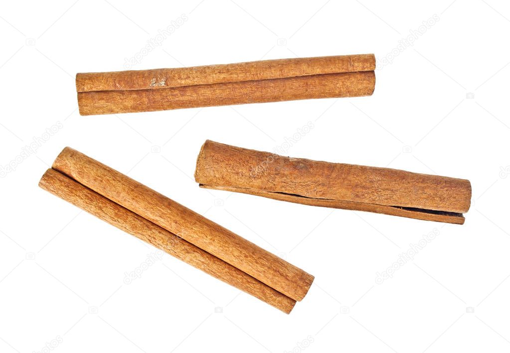 Cinnamon sticks on white background