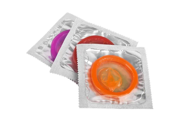 Close up of a colored condoms on white background — Stock Photo, Image