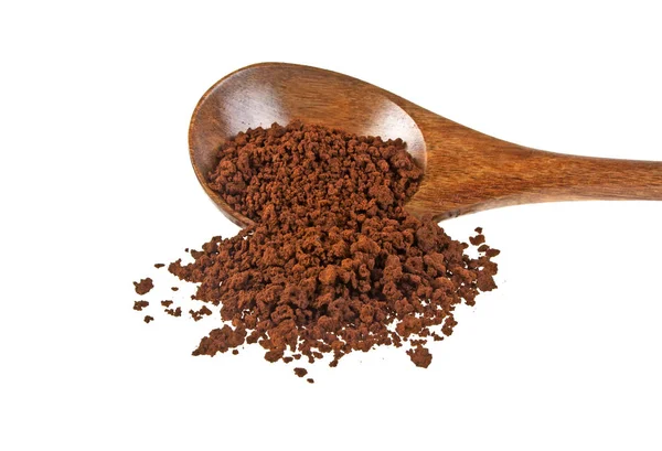 Instant coffee grains in wooden spoon on a white background Stock Image
