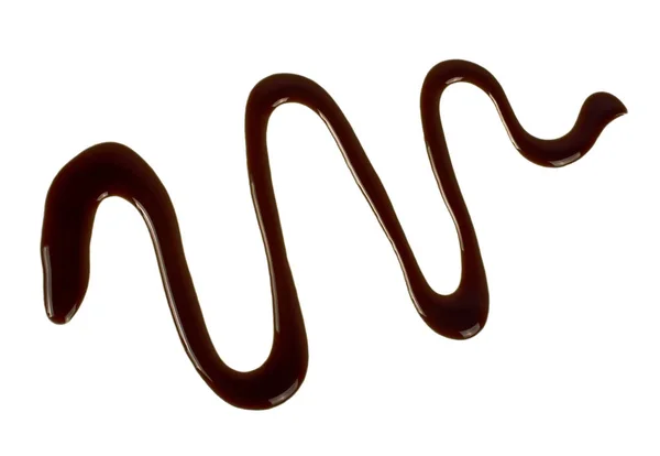 Salsa di cioccolato isolata su sfondo bianco — Foto Stock