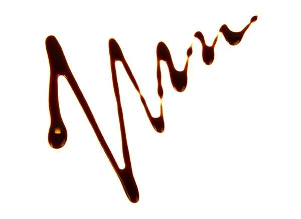Schokoladensauce isoliert auf weißem Hintergrund — Stockfoto
