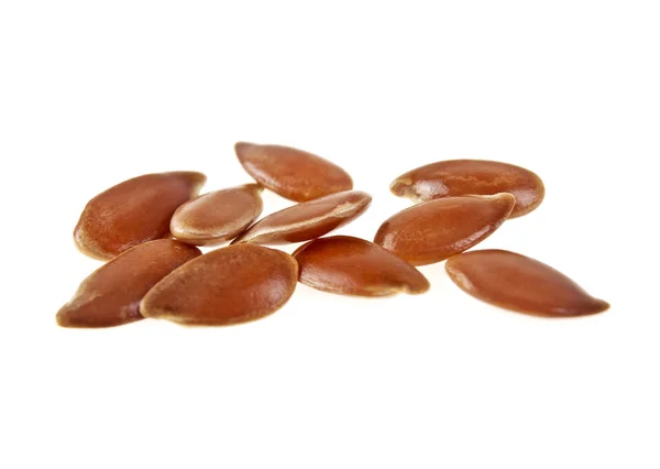Close up de sementes de linho isoladas em fundo branco. Imagem macro — Fotografia de Stock