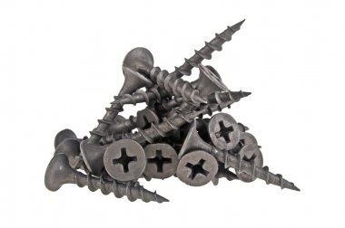 beyaz zemin üzerine siyah vidalar