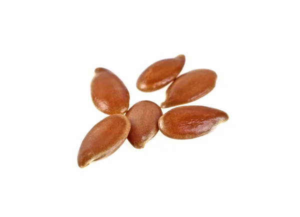 Detailní záběr z lněných semen izolovaných na bílém pozadí. Makro snímek — Stock fotografie