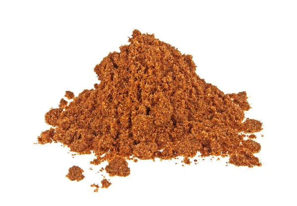 Pile of nutmeg powder isolated on white background — Stock Photo, Image