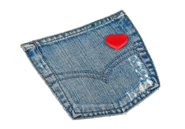 Jeans pocket and red heart on a white background — Stock Photo, Image